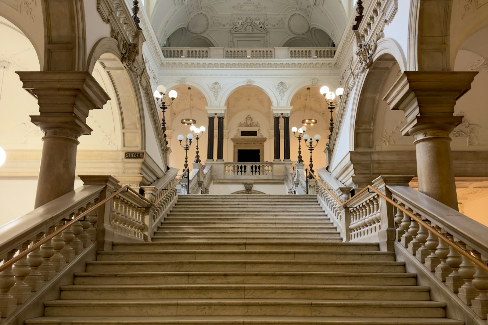 Marble and wrought-iron staircase inside a heritage building